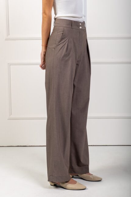 Brown wide-leg trousers with pleats.